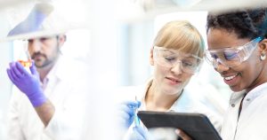 Early Career Paths at Radiofilum include apprenticeships and graduate jobs, like these graduates in the lab